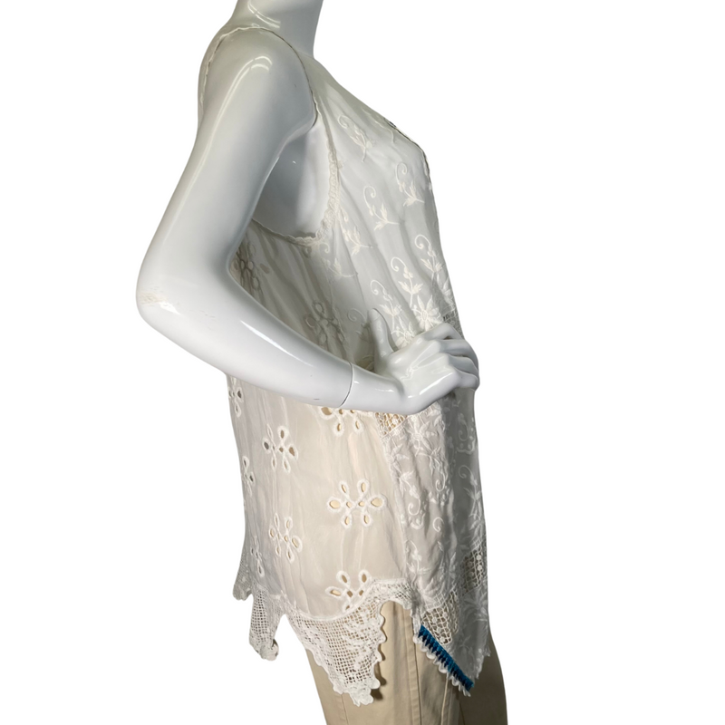 Load image into Gallery viewer, Johnny Was Sheer White Delicate Lace Blouse - Boho-chic white sleeveless tunic with intricate lace, embroidery, and crochet details, perfect for a stylish and breezy look - side view
