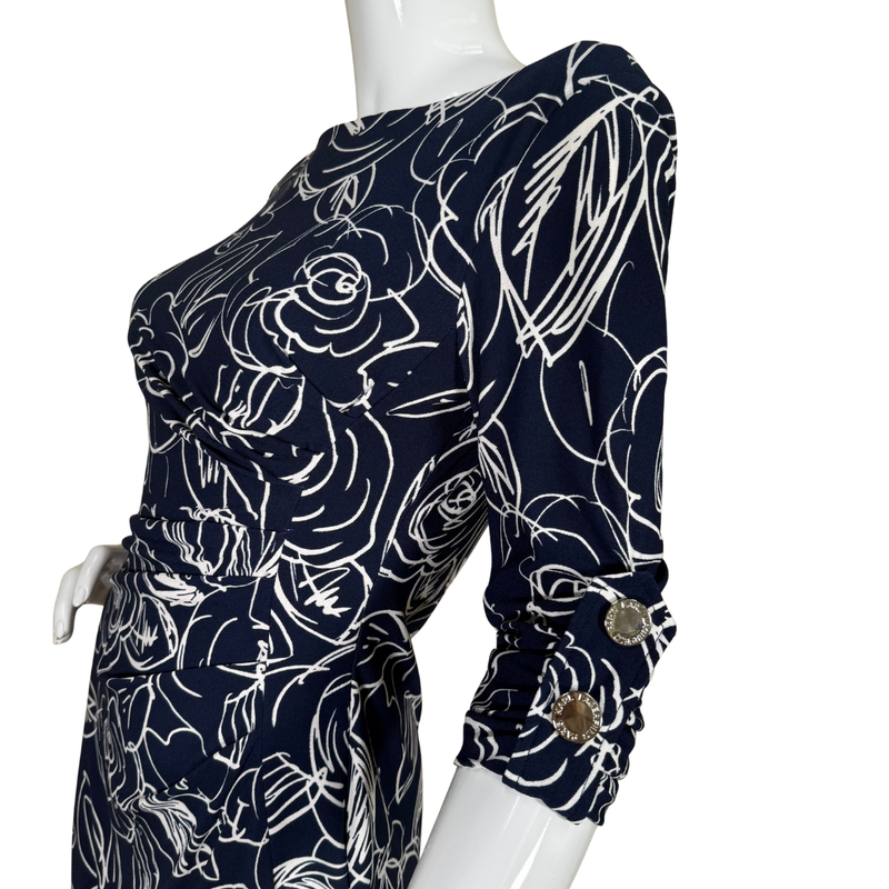 Load image into Gallery viewer, Karl Lagerfeld Navy Floral Print 3/4 Sleeve Dress with white floral line art features a sophisticated 3/4 sleeve design and a figure-skimming silhouette for a polished, feminine look
