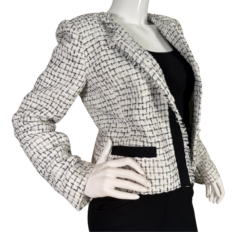 Load image into Gallery viewer, Mannequin wearing a black and white checkered jacket on a white background
