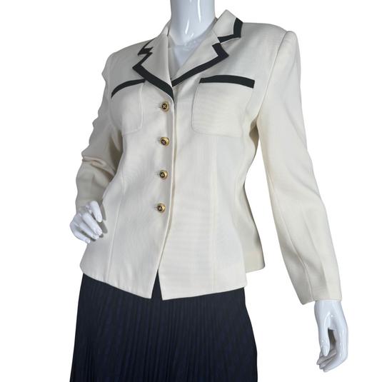 white blazer from Kasper A.S.L., accented with striking black trim