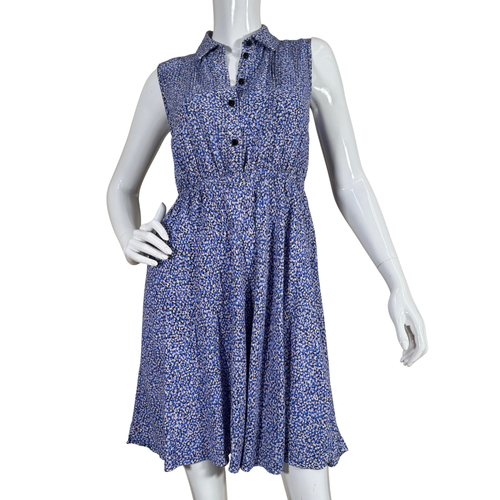 Kate Spade Blue Dot-Patterned Dress features a delicate all-over ditsy floral print perfect for warm-weather days. Designed with a flattering collared neckline and button-down front, it cinches at the waist to create a feminine silhouette