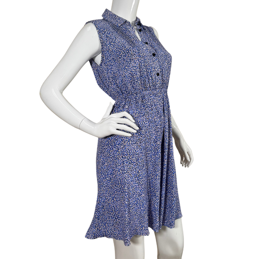 Blue floral dress on a mannequin against a white background