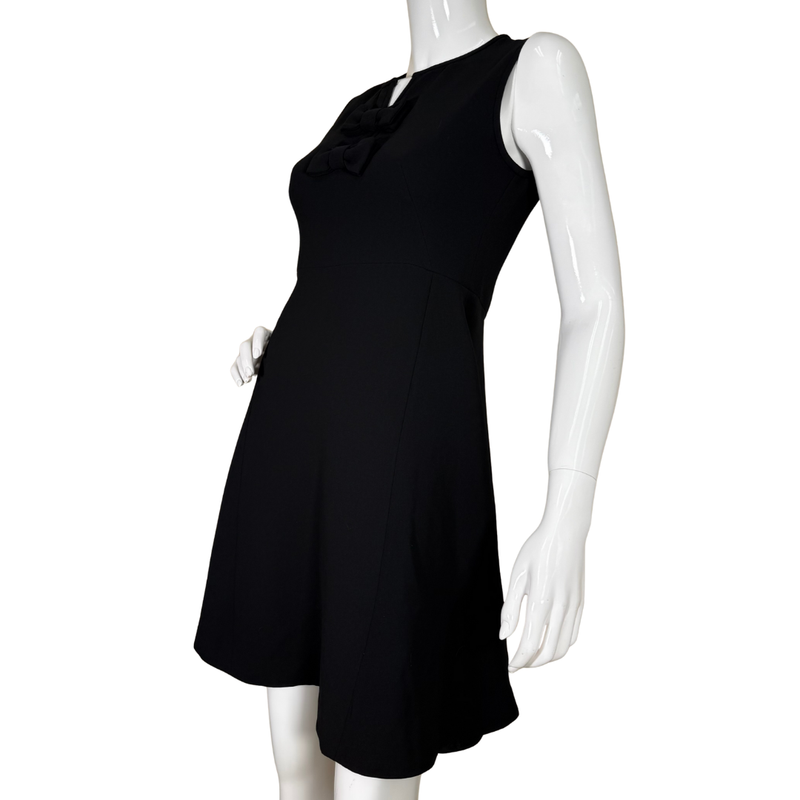 Load image into Gallery viewer, sleek Kate Spade Elegant Black Dress with Double Bow offers effortless sophistication with its gently flared A-line cut and elegant double bow detail at the neckline
