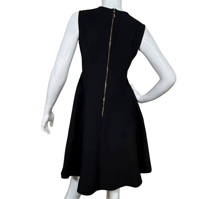 Load image into Gallery viewer, sleek Kate Spade Elegant Black Dress with Double Bow offers effortless sophistication with its gently flared A-line cut and elegant double bow detail at the neckline
