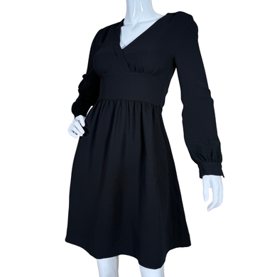 donated Kate Spade Luxury Black Empire Waist Long Sleeve Dress features a flattering empire waist and V-neckline that enhance the silhouette with a touch of elegance