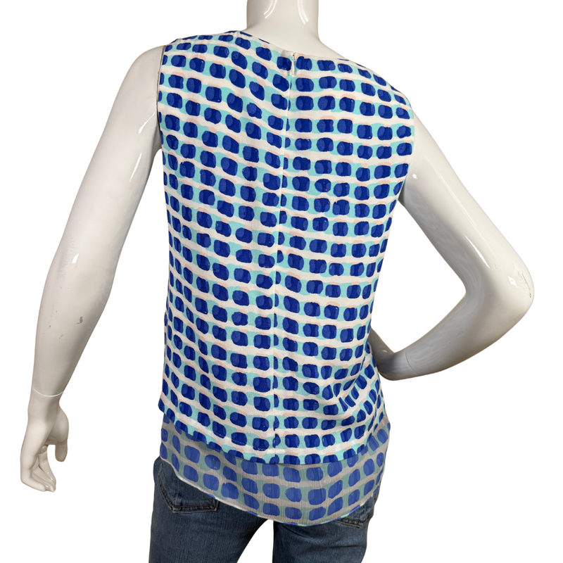 Load image into Gallery viewer, Mannequin wearing a blue and white patterned sleeveless top on a white background
