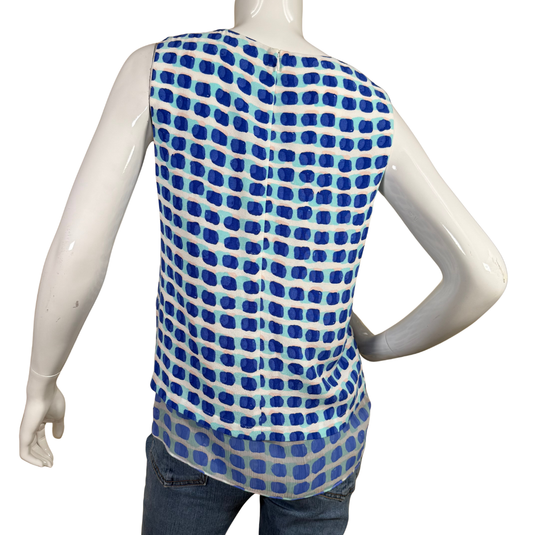Mannequin wearing a blue and white patterned sleeveless top on a white background