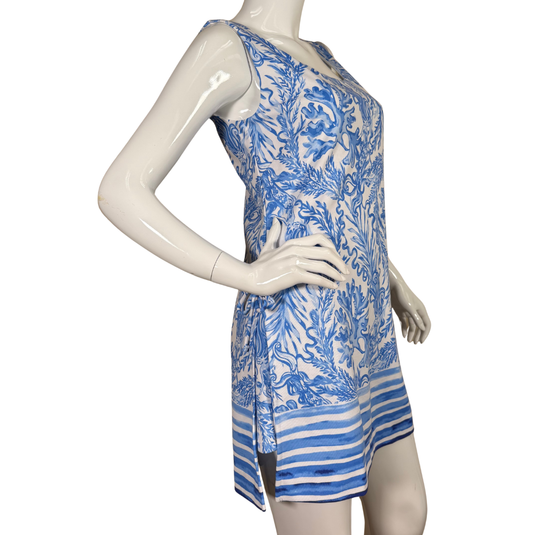 Mannequin wearing a blue and white patterned dress on a white background
