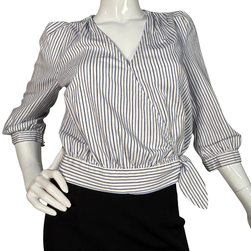 Striped blouse on a mannequin with a white background