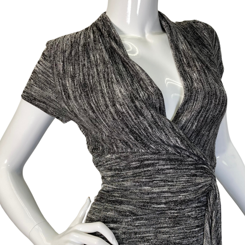 Load image into Gallery viewer, A sleek and stylish Maeve Knitted Dress with V-Neck and Cinched Waist in a textured gray fabric - close up view
