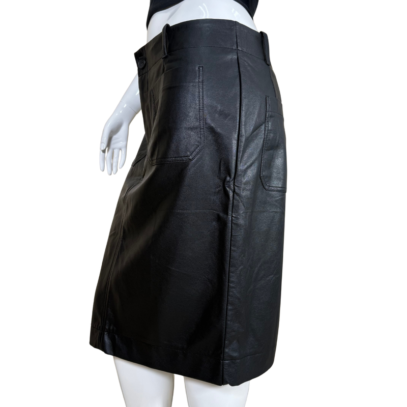 Load image into Gallery viewer, Black leather skirt on a mannequin against a white background
