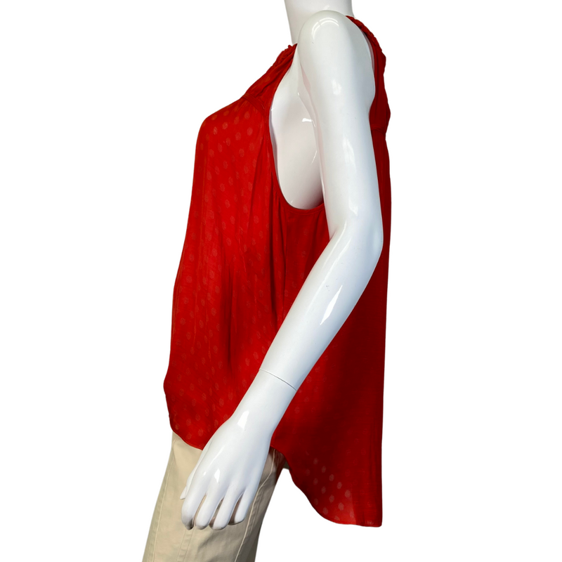 Load image into Gallery viewer, This pre-loved Maeve by Anthropologie&nbsp;Burnt Orange Blouse with Decorative Neckline is a vibrant red sleeveless blouse featuring a delicate, sheer fabric with subtle polka dot details. 
