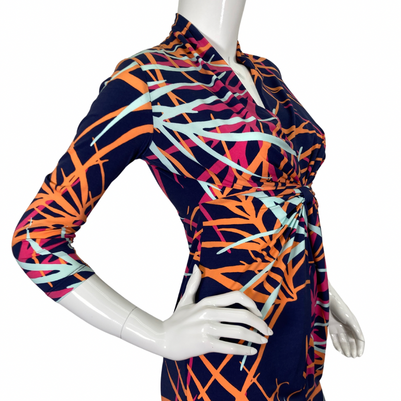 Load image into Gallery viewer,  Tori Richard Vivid Colorful Dress is a stunning statement piece featuring a bold, multicolored abstract print with shades of orange, pink, and light blue on a rich navy background - side view close-up
