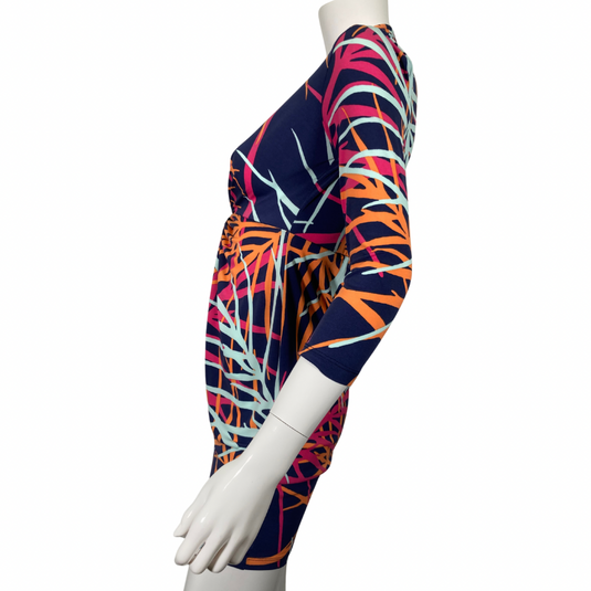  Tori Richard Vivid Colorful Dress is a stunning statement piece featuring a bold, multicolored abstract print with shades of orange, pink, and light blue on a rich navy background - side view