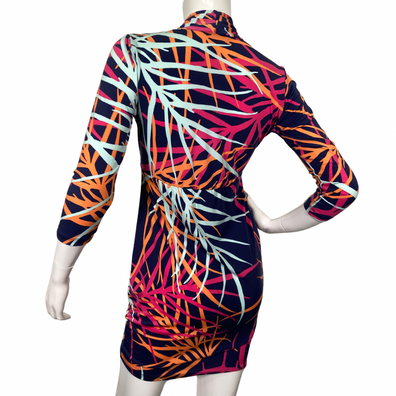 Load image into Gallery viewer,  Tori Richard Vivid Colorful Dress is a stunning statement piece featuring a bold, multicolored abstract print with shades of orange, pink, and light blue on a rich navy background - backside view
