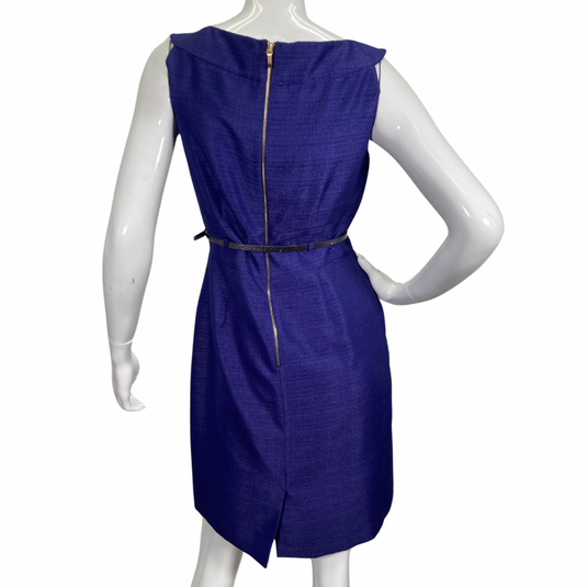 Tahari Elegant Royal Blue Dress is a chic and sophisticated sleeveless sheath dress. It features a structured bateau neckline that adds a touch of elegance, complemented by subtle pleating on the bodice for a tailored fit - backside view 