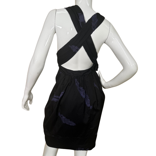 Marc Jacobs Black Neck Wrap Dress with Purple Feathers features a deep V-neckline with a flattering wrap-style bodice