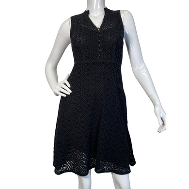 This Meadow Rue by Anthropologie Black Lace Knit Dress is a sleeveless, knee-length piece with a fitted silhouette - front view