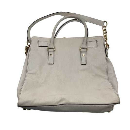 Michael Kors Beige Shoulder Bag with Gold Accents is elegant off-white handbag exudes sophistication with its structured design and gold-tone hardware - backside view