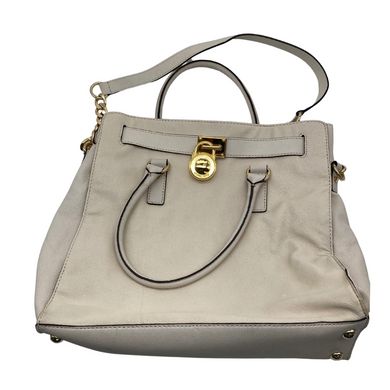 Michael Kors Beige Shoulder Bag with Gold Accents is elegant off-white handbag exudes sophistication with its structured design and gold-tone hardware - front view