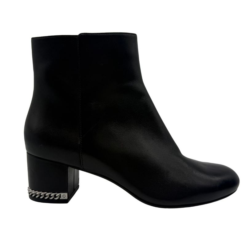 Load image into Gallery viewer, Black ankle boot with a block heel on a white background

