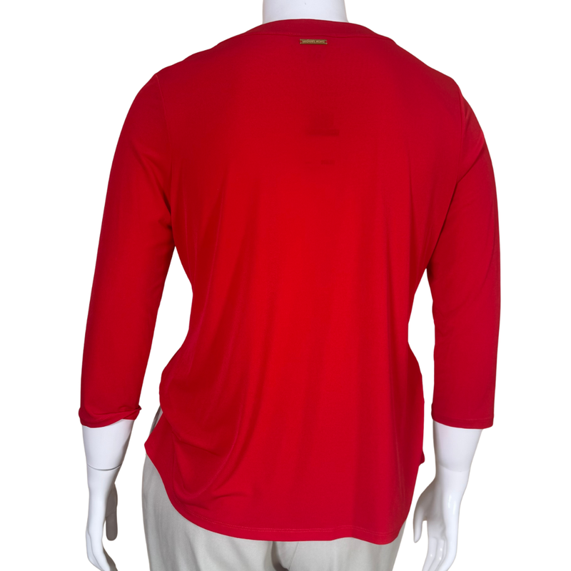Load image into Gallery viewer, Red long-sleeve shirt on a mannequin with a white background
