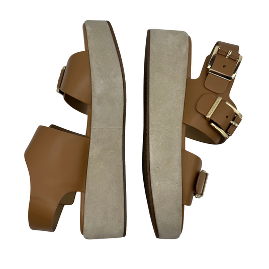 Michael Kors Colby Beige Platform Sandal offer a stylish blend of comfort and elegance.