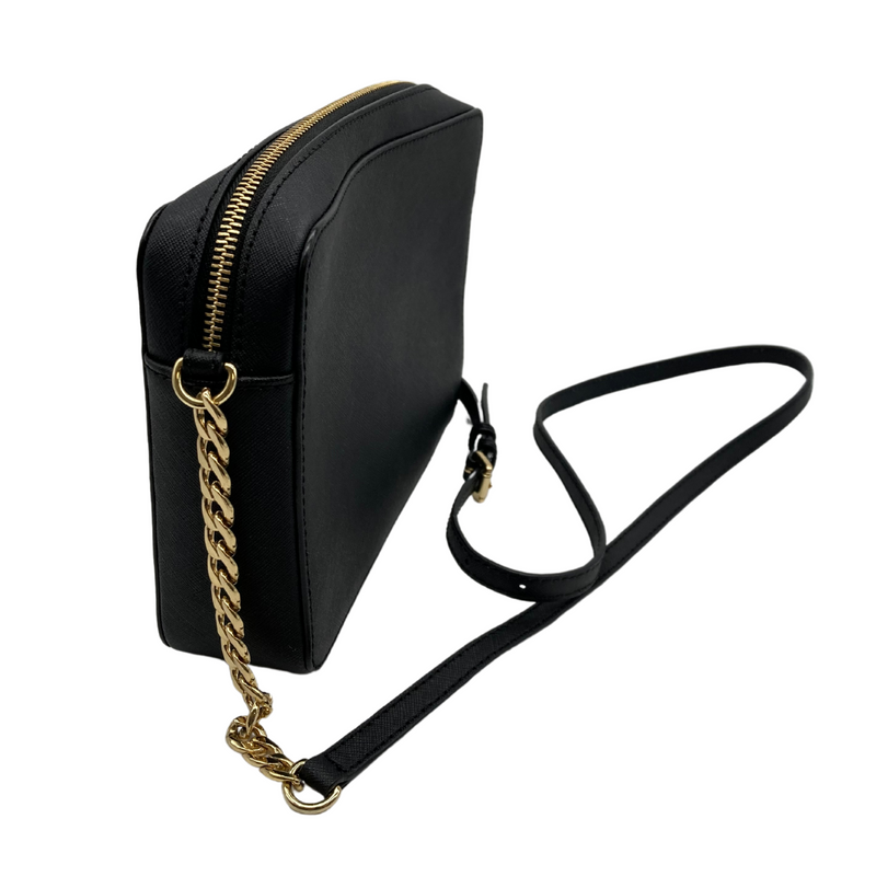 Load image into Gallery viewer, Michael Kors Small Black Shoulder Bag is made from durable Saffiano leather. It features the signature &quot;Michael Kors&quot; logo in gold-tone lettering on the front, adding a sleek and sophisticated touch
