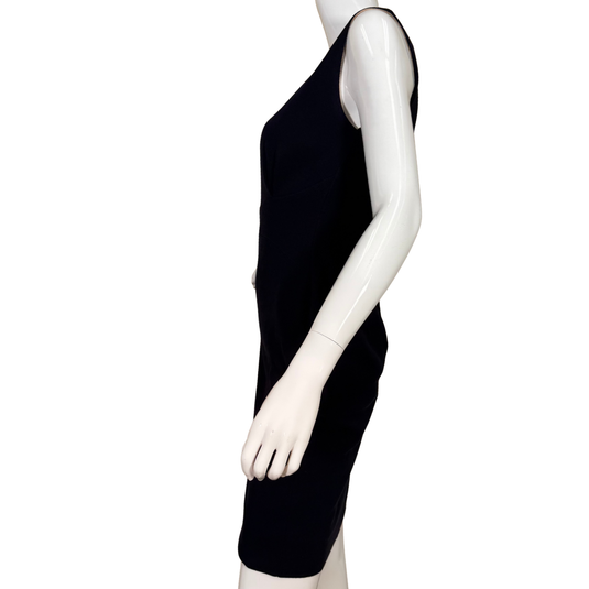 Black dress on a mannequin against a white background