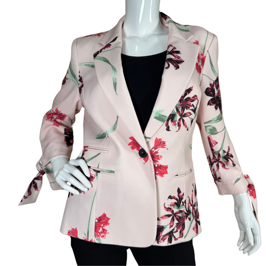 thrifted Nine West Cute Pink Floral Blazer adorned with bold floral prints in red, burgundy, and green hues