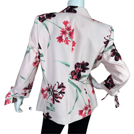 thrifted Nine West Cute Pink Floral Blazer adorned with bold floral prints in red, burgundy, and green hues