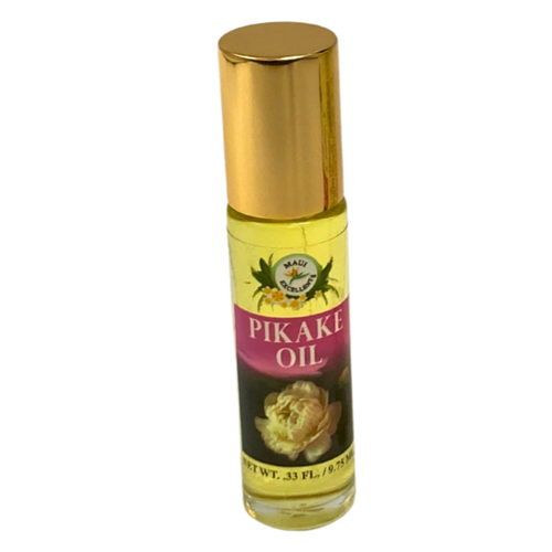 Roll-on bottle of Pikake oil with gold cap on a white background