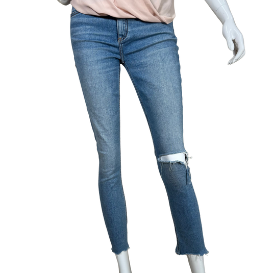 light-wash pre-loved Rag & Bone High-Rise Skinny Jeans feature a trendy distressed design with a ripped knee and raw-edge hems