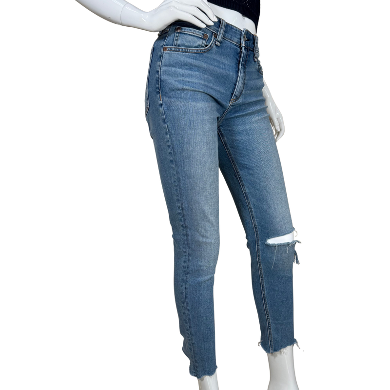 Load image into Gallery viewer, Blue jeans on a mannequin with a white background
