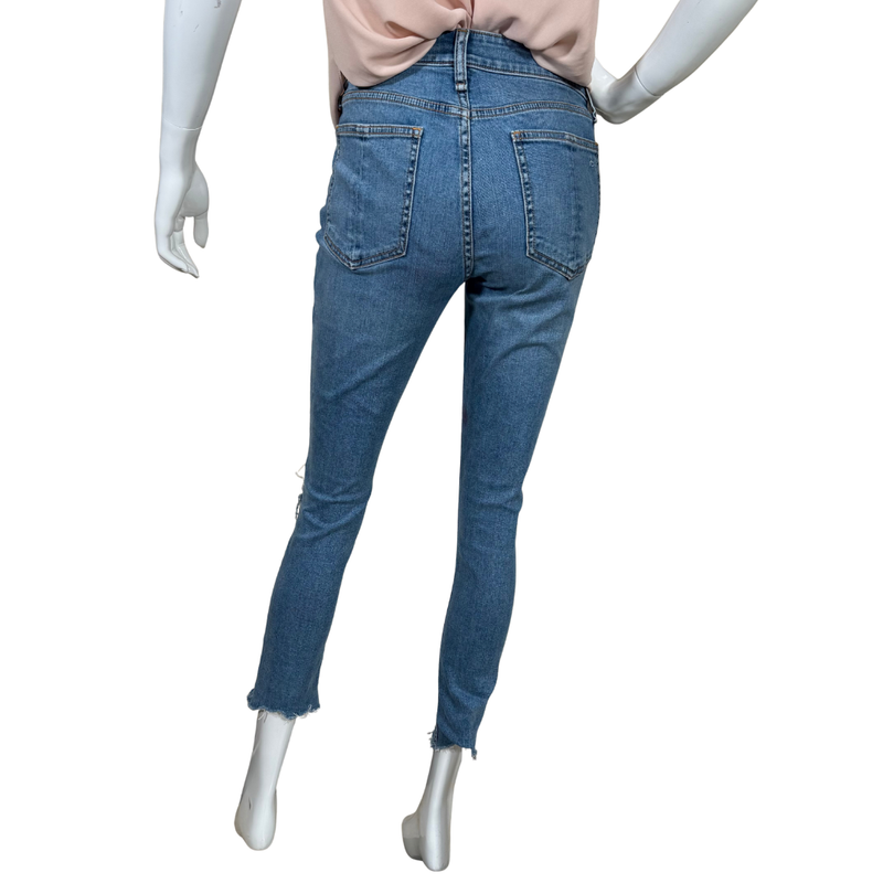 Load image into Gallery viewer, Mannequin wearing blue jeans on a white background
