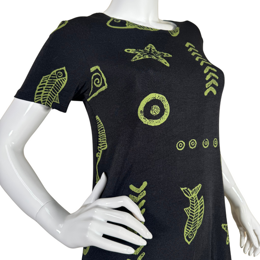 pre-loved Royal Creations Black Polynesian Dress with Green Elements features a unique green tribal-inspired print with artistic motifs, including fish and abstract patterns, adding a touch of bohemian charm