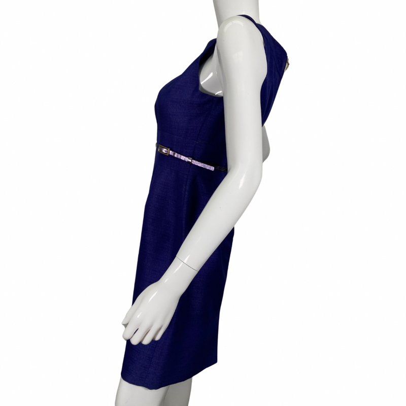 Load image into Gallery viewer, Tahari Elegant Royal Blue Dress is a chic and sophisticated sleeveless sheath dress. It features a structured bateau neckline that adds a touch of elegance, complemented by subtle pleating on the bodice for a tailored fit - side view
