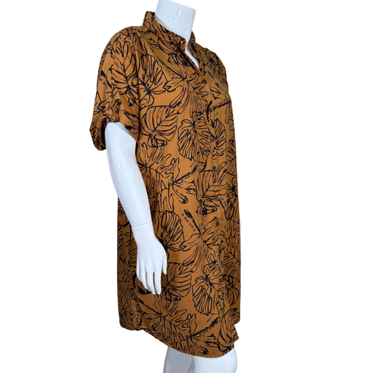 short-sleeved pre-loved Tanoa Brown Button-Up Shirt Dress with Leaf Pattern features an all-over black tropical leaf print on a rich brown background