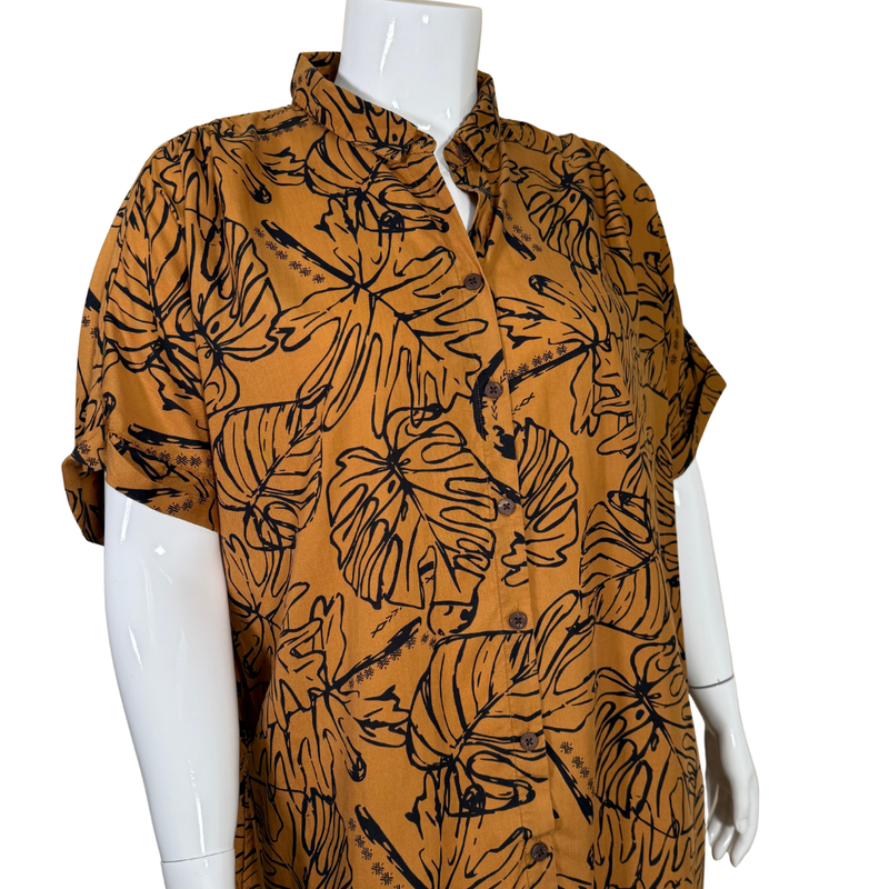 Load image into Gallery viewer, short-sleeved pre-loved Tanoa Brown Button-Up Shirt Dress with Leaf Pattern features an all-over black tropical leaf print on a rich brown background
