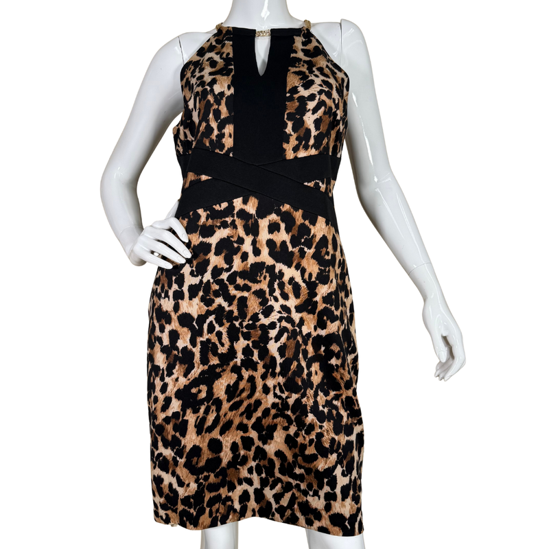 Load image into Gallery viewer, Leopard print dress on a mannequin against a white background
