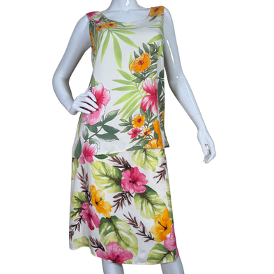  pre-loved The Hawaiian Original Hilo Hattie Tropical Floral Silk Top and Skirt featuring a sleeveless tank top and matching skirt adorned in a bold tropical floral print. 