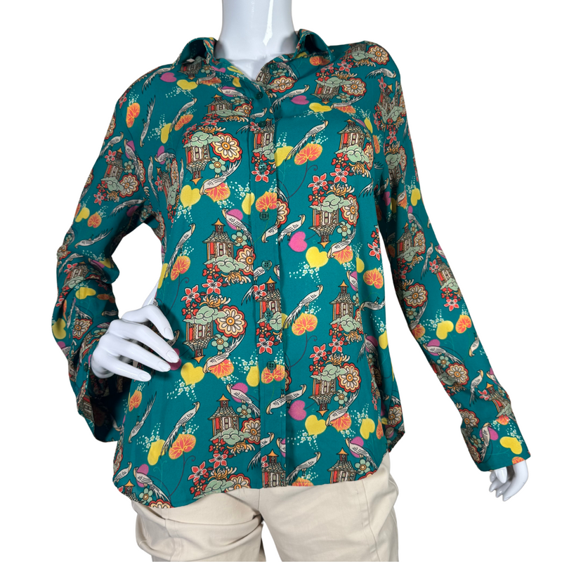 Load image into Gallery viewer, The Shirt Funky Illustrated Shirt is a vibrant long-sleeve button-up shirt features a stunning teal background adorned with an intricate Asian-inspired print - front view
