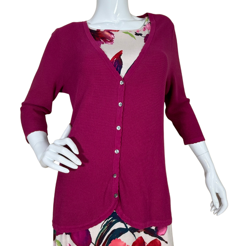 vibrant pre-loved Tommy Bahama Magenta Button-Front Cardigan is a stylish layering piece featuring a soft waffle-knit texture and a flattering V-neckline