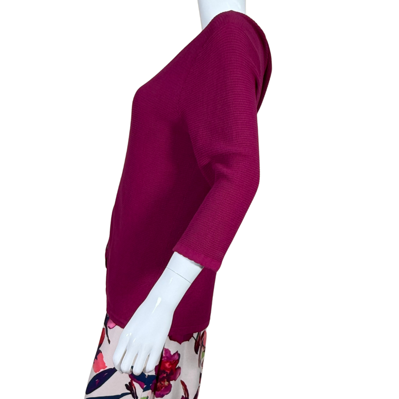 Load image into Gallery viewer, Mannequin wearing a magenta sweater with floral pants on a white background
