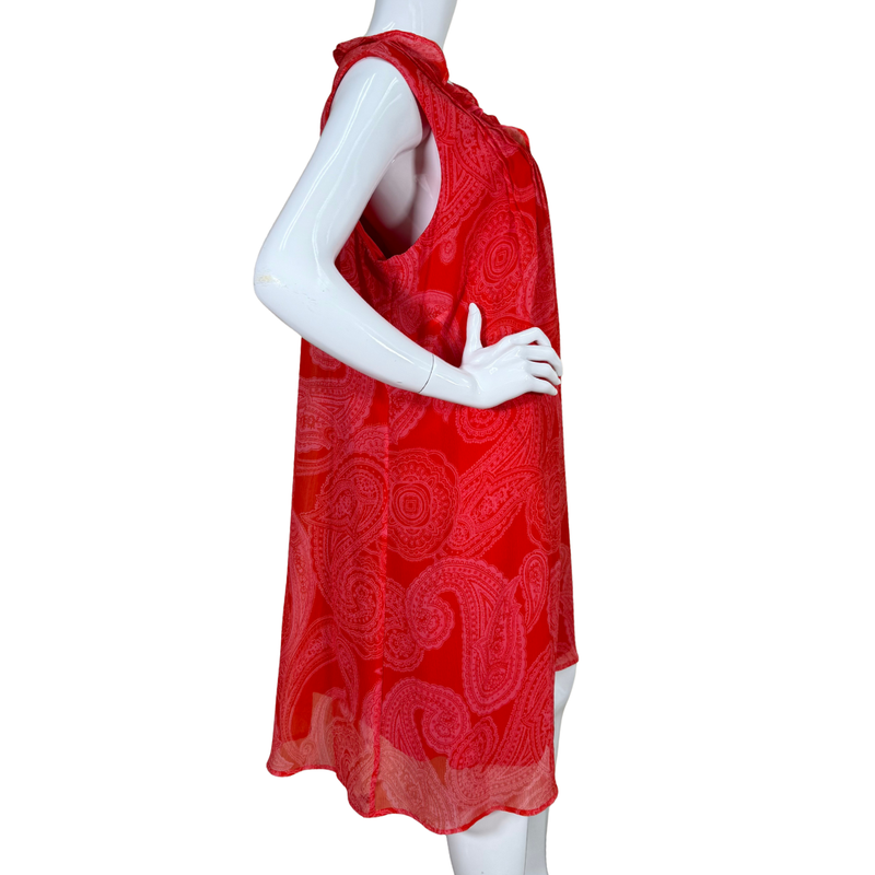 Load image into Gallery viewer, Red patterned dress on a white mannequin against a white background
