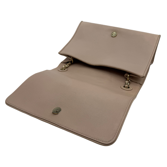 Beige leather clutch bag on a white background