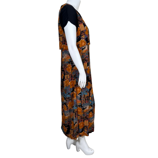 Mannequin wearing a patterned dress on a white background