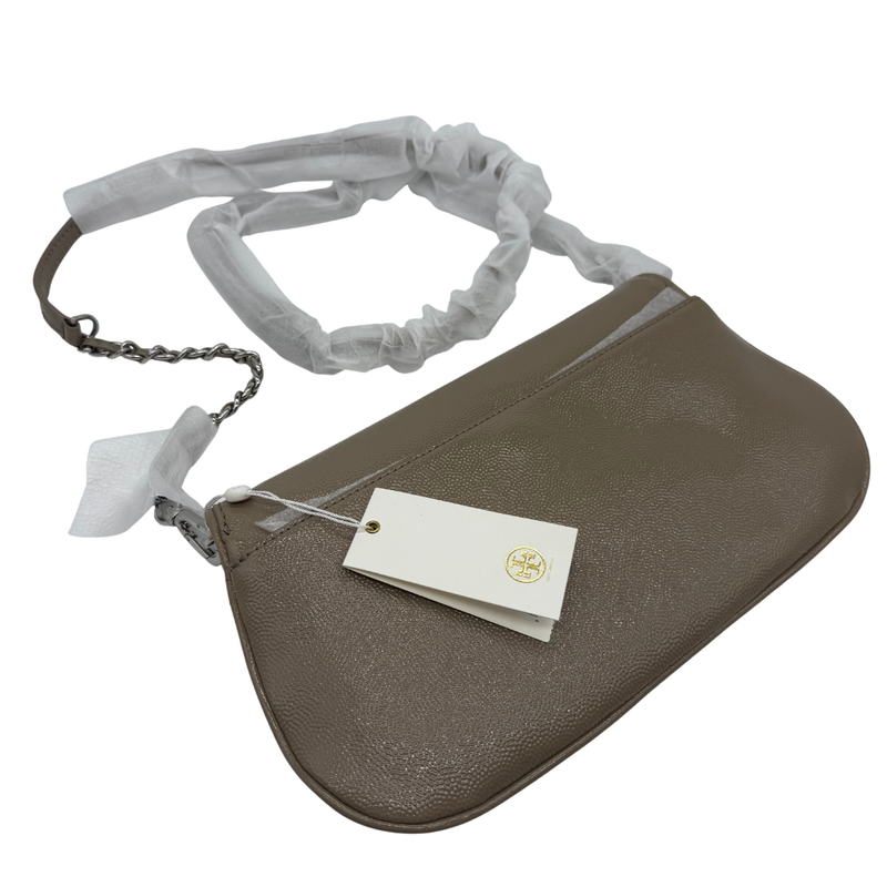 Load image into Gallery viewer, Brown leather crossbody bag with a strap and tag on a white background
