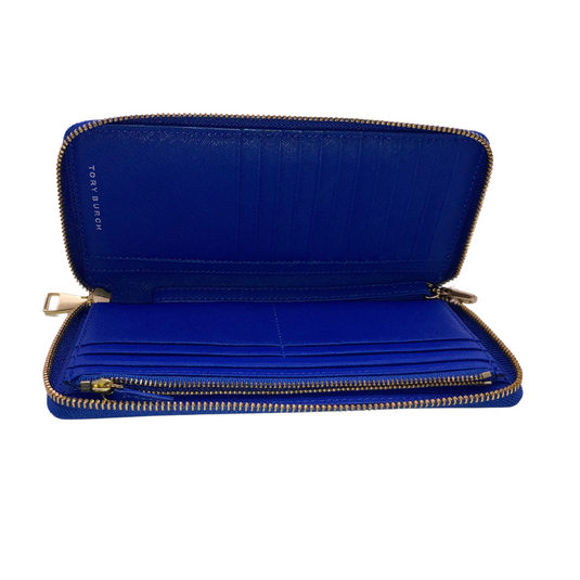 Tory Burch Bright Blue Purse in a striking cobalt blue color is made from high-quality textured leather, it features the iconic Tory Burch logo in gold-tone hardware on the front