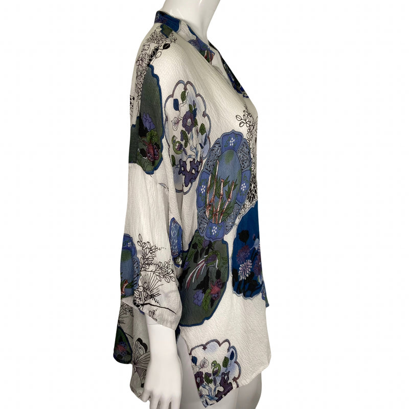 Load image into Gallery viewer, Citron Bamboo Florals Silk Blouse on mannequin side view
